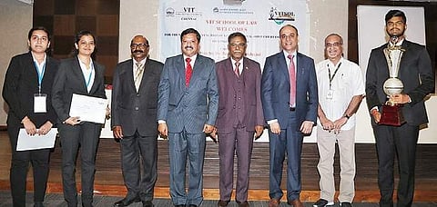 Dignitaries with the winning team from the School of Excellence in Law in the national moot court competition conducted by the VIT School of Law | Express