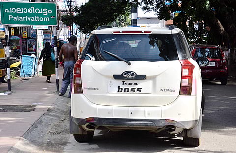 A Tamil Nadu registration vehicle in Kochi with a fancy number plate and the word boss actually stands for 6055 used for representative purpose