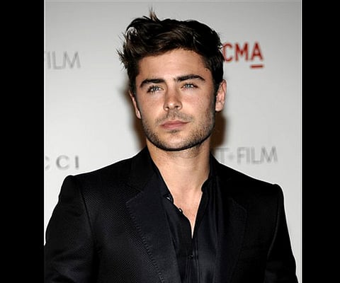 Zac Efron arrives at the inaugural LACMA Art Film Gala in Los Angeles (AP Photo/Dan Steinberg).