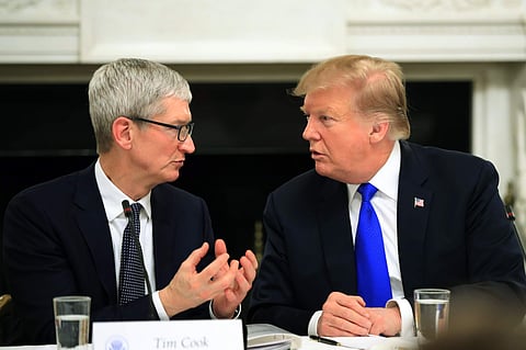 Tim Cook (Left) and Donald Trump