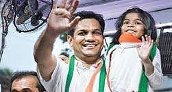 Hibi Eden with his daughter Clara during the campaign trail