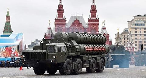 Russian S-400 Triumph medium-range and long-range surface-to-air missile systems ride through Moscow's Red Square during a parade. (Photo | AFP)