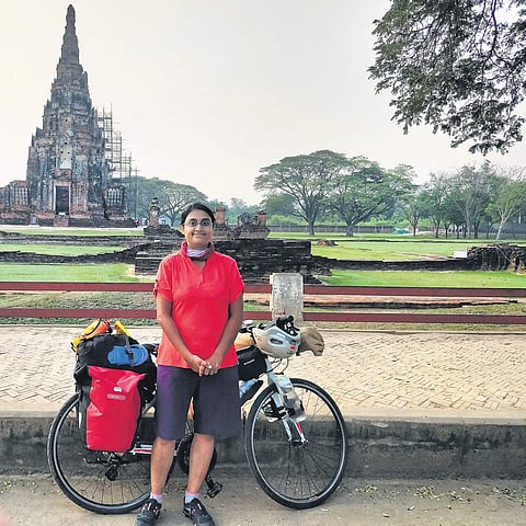 The writer posing at Angkor Wat temple complex in Siem Reap, Cambodia