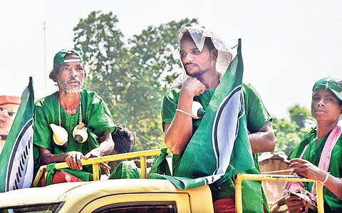Conch blowers in a campaign rally take cover from heat in Bhubaneswar I express