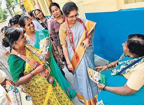 State BJP vice president Tejaswini Ananth Kumar campaigns for the party’s Bangalore South candidate Tejasvi Surya on Friday. | Express Photo Services
