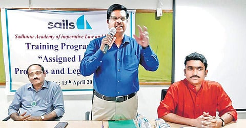 Nalsar Registrar Prof V. Balakista Reddy, speaking at a training programme on ‘Challenges on Assigned Lands’ in Hyderabad on Saturday. (Photo | EPS)