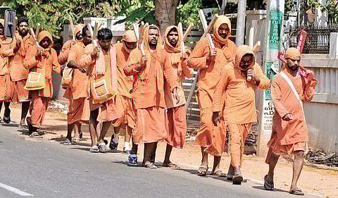 A group of pilgrims at Aluva on their way to Malayattoor Kurisumudy A Sanesh