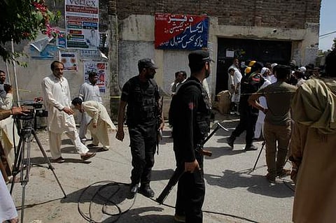 Pakistan police commandos stand outside a government office. (File Photo| AP)
