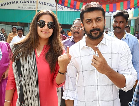 Actor-couple Suriya and Jyothika pose for photos after casting their votes in Chennai. (Photo | EPS)
