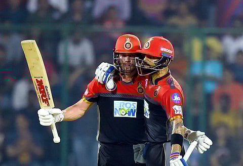 Royal Challengers Bangalore's AB De Villiers and captain Virat Kohli| PTI