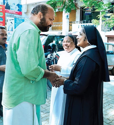 LDF candidate P Rajeev greeting nuns at St Francis Assisi Cathedral in Kochi on Thursday| Express