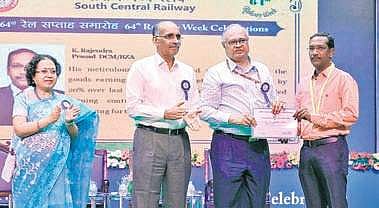 DCM and in-charge PRO K Rajendra Prasad receives GM’s Award from SCR GM Gajanan Mallya | Express