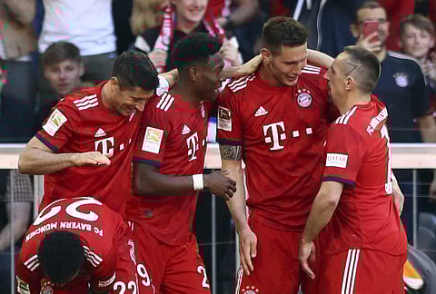 Bayern grind out Bremen win to stay ahead of Dortmund