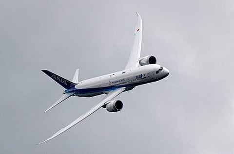 Boeing 787 Dreamliner takes part in a flying display at the Farnborough Airshow, south west of London, on July 12, 2016.