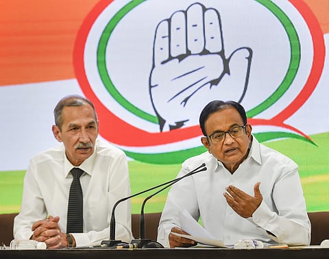 Congress leaders P Chidambaram addresses a press conference as Lieutenant General retired DS Hooda looks on at AICC headquarters in New Delhi (Photo| PTI)