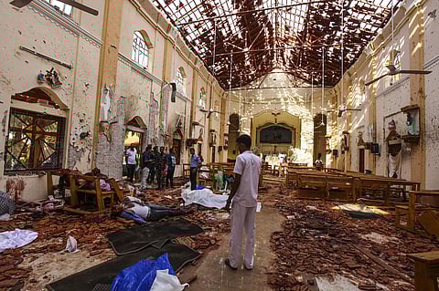 Dead bodies of victims lie inside St. Sebastian's Church damaged in blast in Negombo, north of Colombo, Sri Lanka. (Photo | AP)