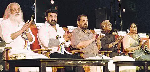 Singer KJ Yesudas, actors Mohanlal and Madhu, lyricist Sreekumaran Thampi and actor K R Vijaya during the release of the book ‘P Subramaniam- Malayalacinemayile Bheeshmacharyan’ at Tagore Theatre, Thiruvananthapuram, on Saturday | Vincent Pulickal