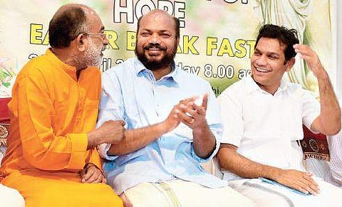 Ernakulam Lok Sabha candidates Alphonse Kannanthanam (NDA), P Rajeev (LDF) and Hibi Eden (UDF) sharing a light moment at the inter-religious Easter celebration held at Chavara Cultural Centre in Kochi Express