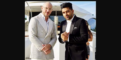 Singers Guru Randhawa and Pitbull in 'Slowly Slowly. (Photo |Guru Randhawa Twitter)