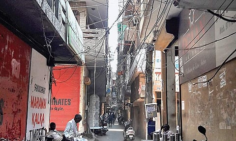 Most Lal Dora villages are choked with garbage, low-hanging wires, water leakages and a lack of basic amenties such as clinics and schools | Express