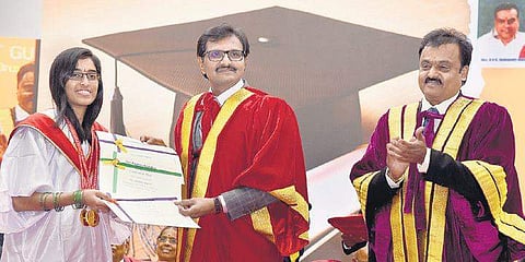Dr S Eswara Reddy presenting gold medal and degree to a student at convocation of Sri Ramachandra Institute Of Higher Education And Research | Martin Louis