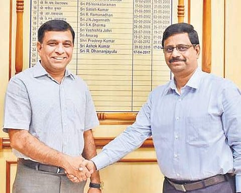 P Srinivas (right) after taking charge as Vijayawada Divisional Railway Manager in Vijayawada on Monday | Express