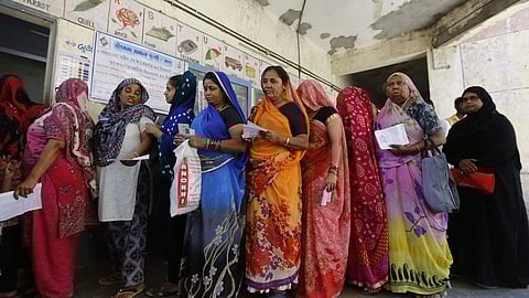 Women queued up to cast their vote for general election in Ahmedabad.