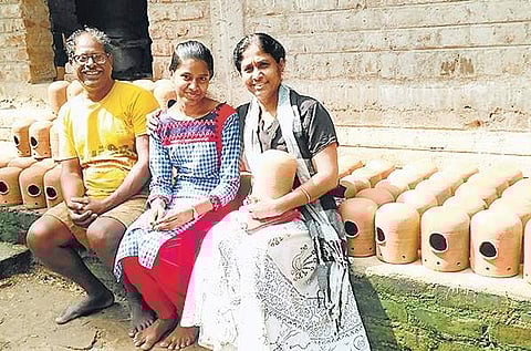 Sadhana works with a potter to makes nests, which she distributes for free