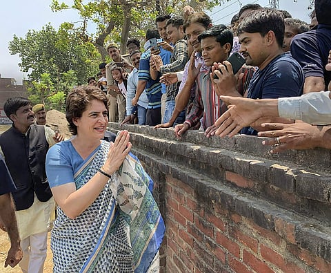 Congress General Secretary Priyanka Gandhi Vadra meets her supporters during an election campaign for Lok Sabha elections. (Photo | PTI)