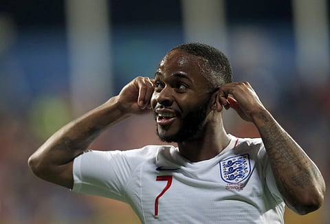 Sterling celebrated his goal against Montenegro by cupping his ears towards the home fans as a sign of defiance | AP