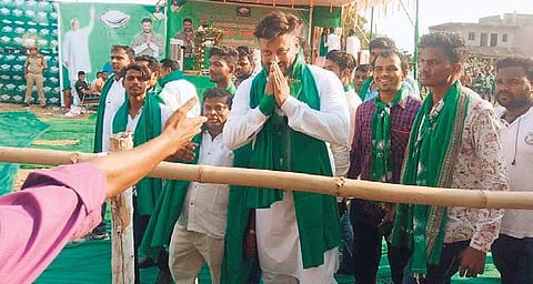 BJD MP candidate Anubhav Mohanty greeting people at an election meeting