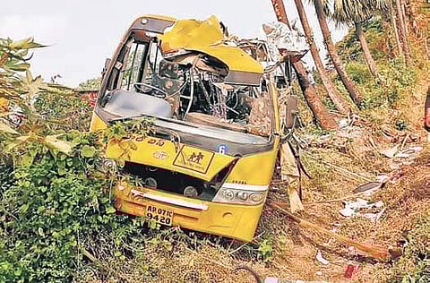 The mangled remains of a bus which hit a palmyra tree at Dora Kalva bridge near Nagaram in Repalle of Guntur district on Friday | EXPRESS
