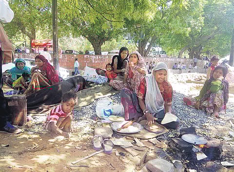 Left homeless by anti-encroachment drive, the families are now at the mercy of nature in the open | RITWIKA MITRA