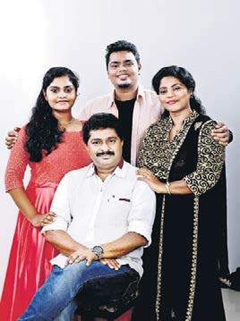 Alan Joy Mathew and his family