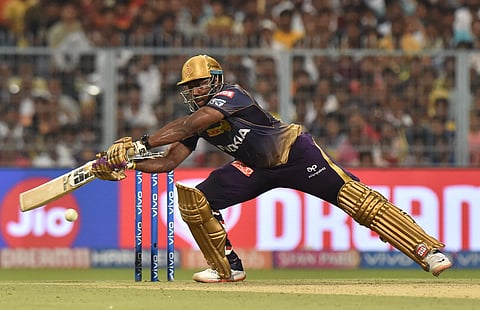Superhero to the rescue: KKR's Andre Russell in action against MI (Photo | PTI)