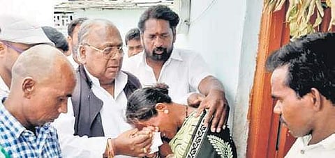 Congress leader V Hanumanth Rao consoles the mother of Jyothi, a student who committed suicide, in Kanakalu village on Sunday | Express