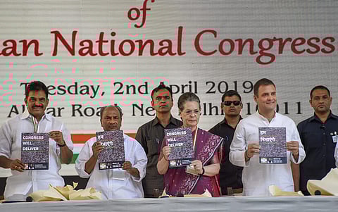 Congress President Rahul Gandhi with senior party leaders Sonia Gandhi and AK Antony along with Congress General Secretary K C Venugopal release party's manifesto for Lok Sabha polls 2019 in New Delhi on 2 April 2019. (Photo | PTI)