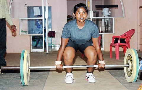 C Sneha began weightlifting when she was in class 9, drawing inspiration from her sister who plays the same sport