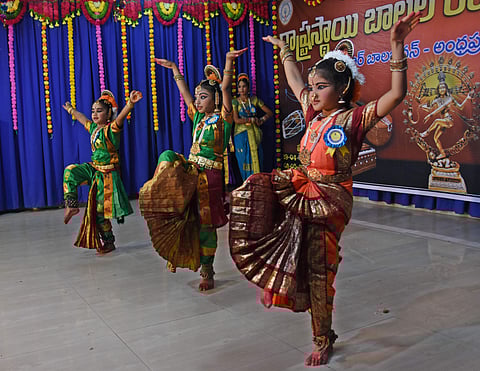 Students performing a dance during a state level theatre art celebrations for children at Montessori Mahila Kalasala in Vijayawada on Monday|P Ravindra Babu