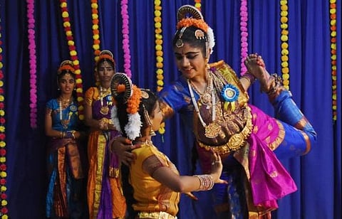 Students performing a dance during a state level theatre art celebrations for children at Montessori Mahila Kalasala in Vijayawada on Monday | P Ravindra Babu