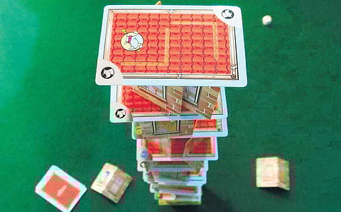 A card game that is a cross-breed of Uno & Jenga