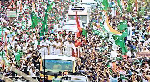 AICC president Rahul Gandhi and general secretary Priyanka Gandhi Vadra greeting party workers during the road show at Kalpetta after Rahul Gandhi filed his nomination papers in Wayanad on Thursday | A Sanesh