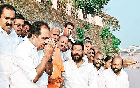 Benny Behnan, UDF candidate in Chalakkudy, paying homage to water at the Aluva Adwaithasramam ghat. (File | EPS)