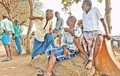 A group of veteran fishermen - Pathrose, Lesli, Roland, Tony and Gregory - engaged in a heated political debate which has all the makings of a brawl, at Valiyathura Junction in the state capital | BP Deepu