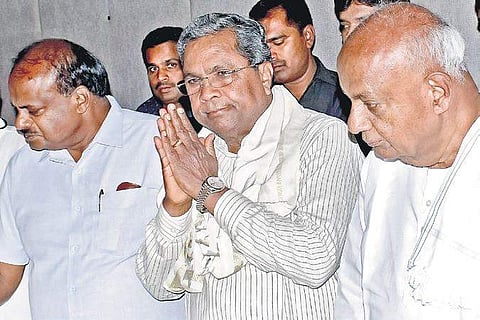 CM HD Kumaraswamy, Congress leader Siddaramaiah and JD(S)patriarch HD Deve Gowda at a press conference (File| Pandarinath B)