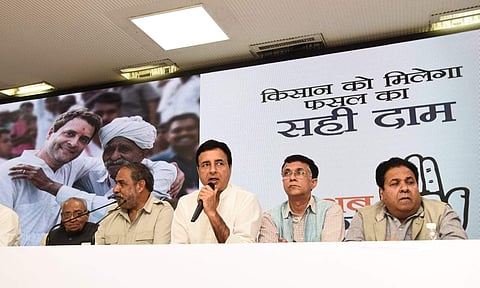 Congress senior leaders Anand Sharma and Randeep Singh Surjewala launching party's Lok Sabha poll 2019 campaign slogan 'Ab Hoga Nyay' at AICC headquarters in New Delhi on Sunday. (Praveen Negi | EPS)