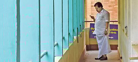 Opposition leader Ramesh Chennithala seen busy with his mobile phone just before speaking to journalists at the meet-the-press programme (Janayatham-2019) organised by Thiruvananthapuram Press Club on Monday | BP Deepu