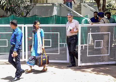 Income Tax officials during the second day of their raid at the residence of Praveen Kakkar OSD to MP Chief Minister Kamal Nath in Bhopal Monday April 8 2019. | PTI
