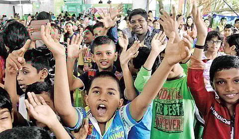Children cheering during the theme song release of ICFFK at Kerala State Council for Child Welfare on Thursday B P Deepu