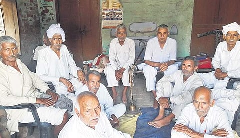 Elderly Jat villagers gather at a chaupal to discuss the political scenario at Sisana village in Haryana which goes to vote on 12 May 2019. (Photo | Somrita Ghosh, EPS)